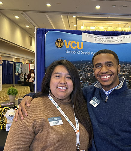 M.S.W. student Wendy Hernandez-De La Cruz of California State University-Monterey Bay and VCU B.S.W. student Oscar Kemp pose at the 2022 CSWE conference.